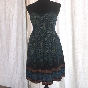 Exhilaration halter-type mid-length dress.